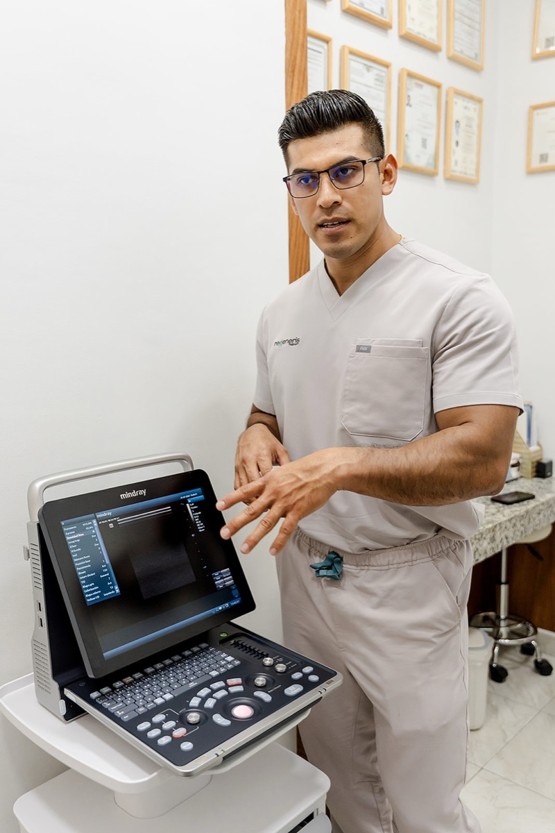 Specialist with ultrasound at Regeneris Therapy