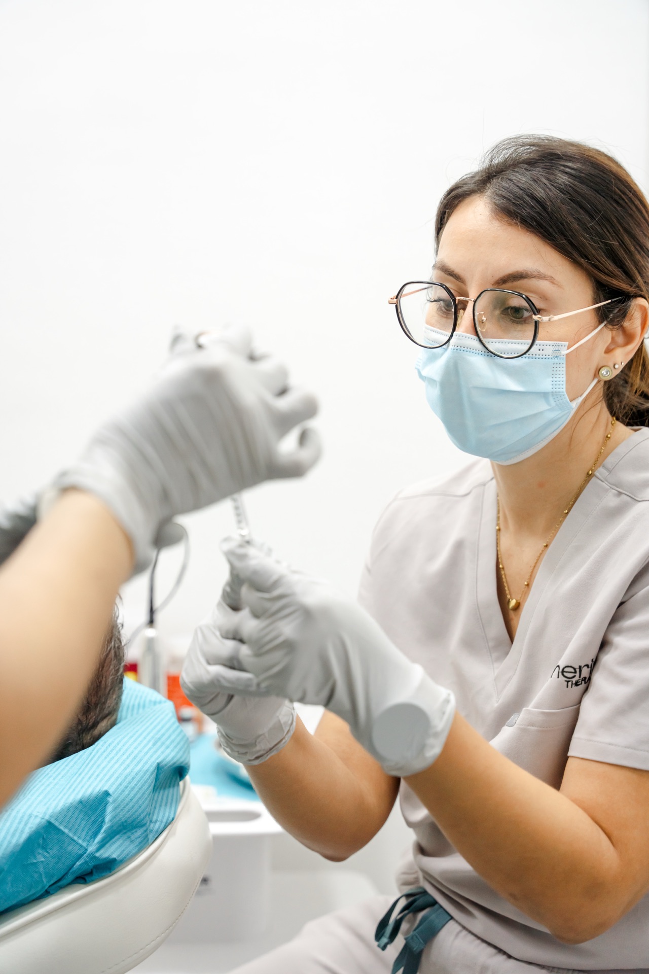 Patient receiving NAD+ intravenous therapy for cellular rejuvenation at Regeneris Therapy.